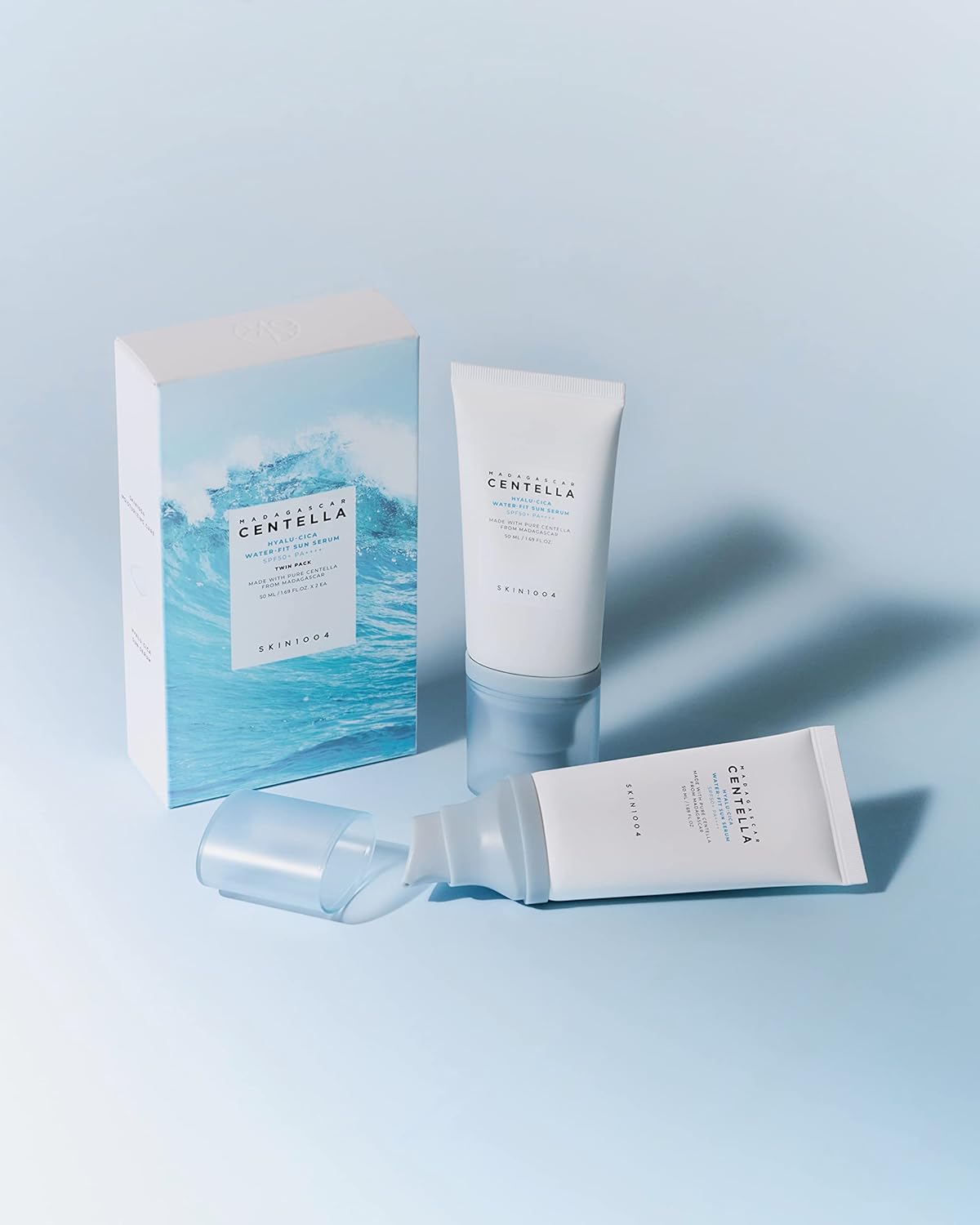 Two Bottles of Cica Serum Water Sunscreen with Centella from Skin 1004 - 50+50 ml